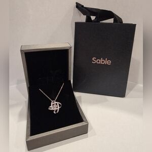 Sable Moissanite Love Knot Dancing Pendant Necklace Occasion Valentine Gift NIB